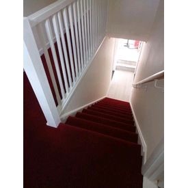 Red wool blend carpet stairs and landing