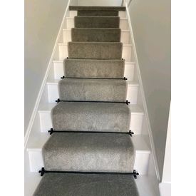 grey stair runner with black stair rods