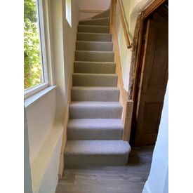 Kersaint Cobb Luna wool boucle carpet fitted to stairs