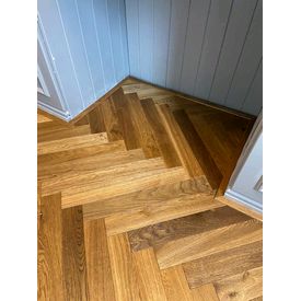 Smoked Oak parquet fitted in Hallway with colour matching beading